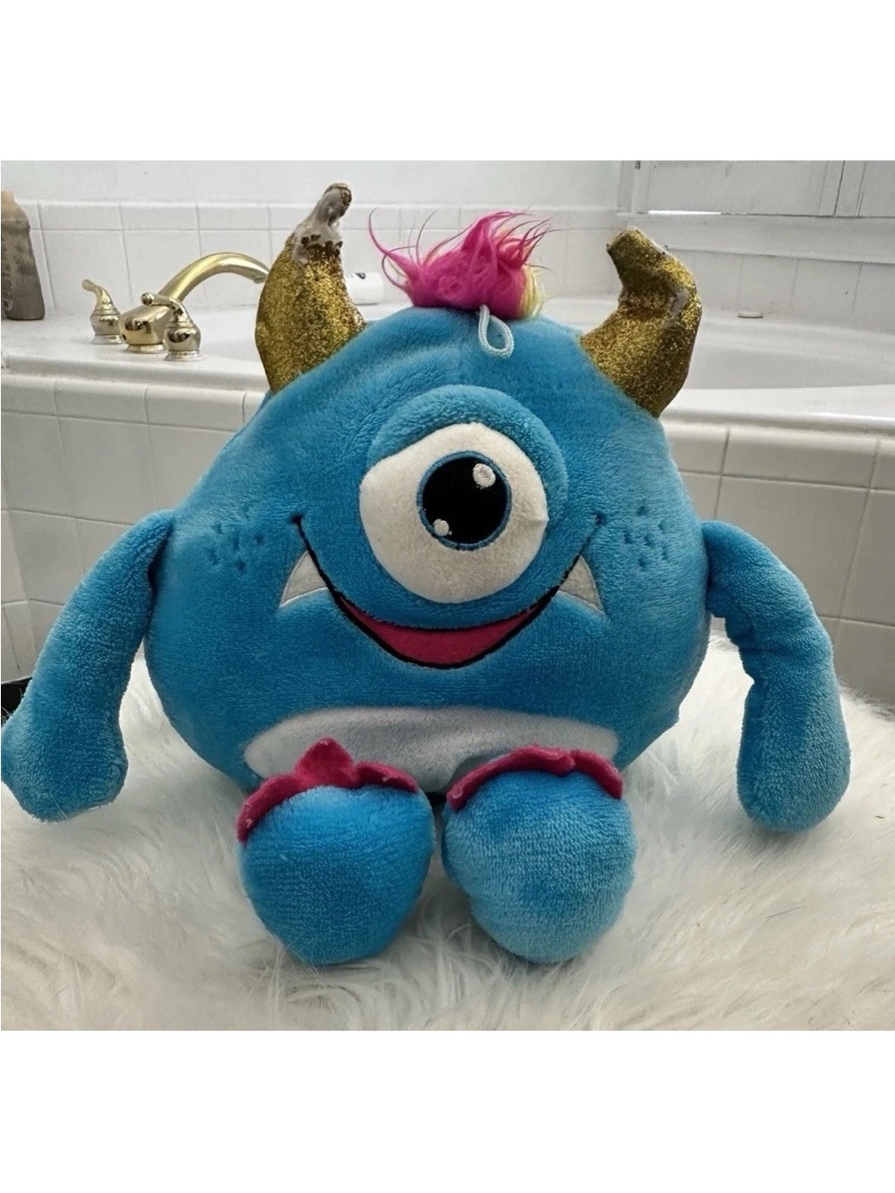 Blue One-Eyed Plush Monster Toy with Gold Horns
